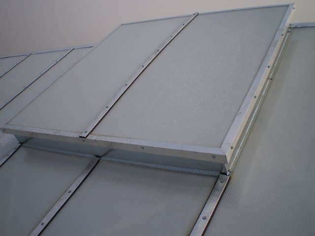 Daylight and extraction domes on a completed roof